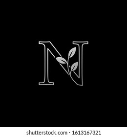 Outline Letter  N  Nature Tropical Leaf Initial logo Icon. Silver classy color logo icon vector design concept monogram vintage luxury.