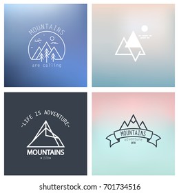 Outline mountain icon set. Vector blurred background.