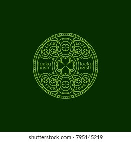 Outline round flourish badge with horseshoes and shamrock leaves. Vector illustration.