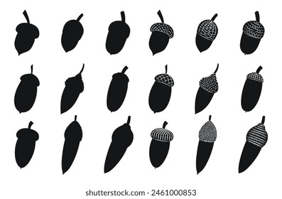 Outline silhouettes of oak acorns and hats, isolated vector