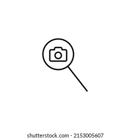 Outline symbols in flat style. Modern signs drawn with thin line. Editable strokes. Suitable for advertisements, books, internet stores. Line icon of photo camera under magnifying glass  
