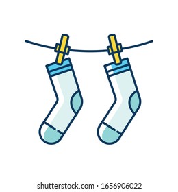 Outside drying blue and yellow RGB color icon. Laundry, clothesline, outdoors clothes drying. Socks hanging on clothesline, clean clothing, washed garment. Isolated vector illustration