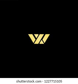 Outstanding professional elegant trendy awesome artistic black and gold color WX XW initial based Alphabet icon logo.