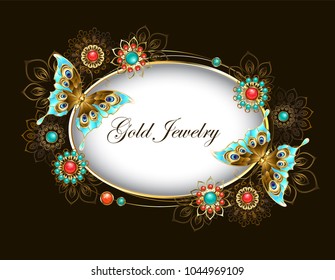 Oval banner adorned with butterflies and ethnic, jeweled ornaments encrusted with turquoise and jasper on  brown background.