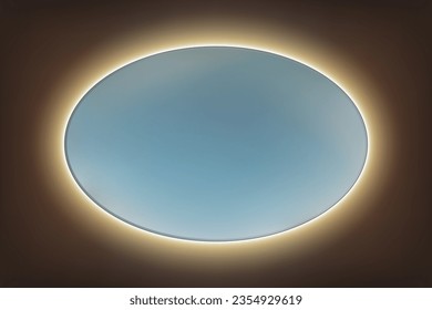 Oval mirror with rounded corners with yellow LED backlight on a dark wall. Modern elliptical piece of furniture with bathroom lighting