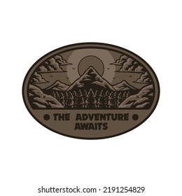 Oval shaped emblem of brown mountain 