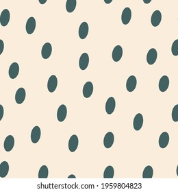 Oval spots. Polka dot fabric. An infinite number of green dots. Seamless pastel pink pattern for textiles, paper, packaging, curtains, pillows, bedspreads, bed linen. Actual colors. Vector graphics.