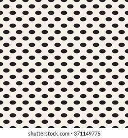 Oval vertical point. Black dots on white background. Vector seamless pattern.