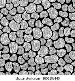 Patrón de madera ovalada sobre fondo negro