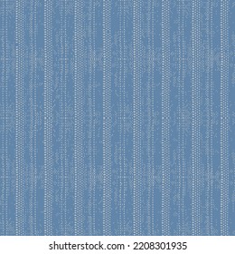 Over head close up view of a white and beige mat with interlinking stitches and vertical lines. Texture light blue background with light colors and lines pattern. Abstract backdrop.