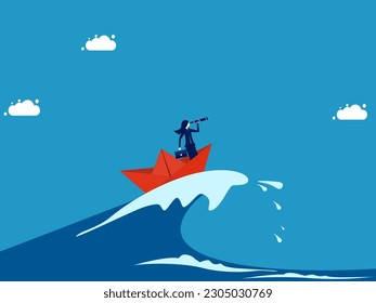 Overcome crises with patience and vision. Businesswoman surfing sea waves with paper boat - Shutterstock ID 2305030769