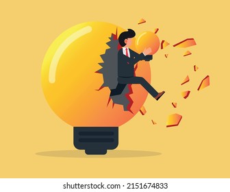 Overcoming obstacles. businessman holding a light bulb and jumping out of a broken light bulb
