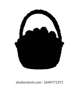 Overflowing wicker basket of walnuts silhouette isolated on white background