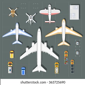 Overhead   point of view airport with all the buildings, planes, helicopter,  vehicles and  runway