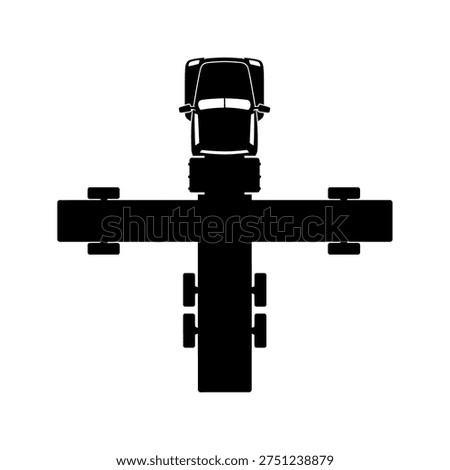 Overhead view of a truck positioned on an automotive lift, showcasing vehicle maintenance and repair setup.