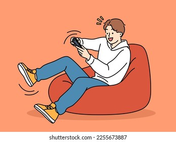 Overjoyed boy relax at home playing video games at home. Smiling child with joystick have fun involved in gaming and virtual reality. Vector illustration. 