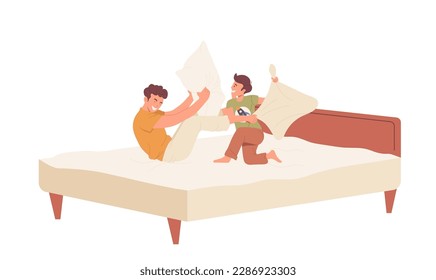 Overjoyed dad and little son child playing pillows in bed spending time together, happy fathers day