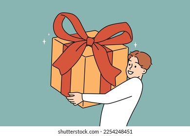 Overjoyed young man holding huge wrapped gift in hands excited with birthday celebration. Smiling guy with present greeting or congratulating. Vector illustration. 