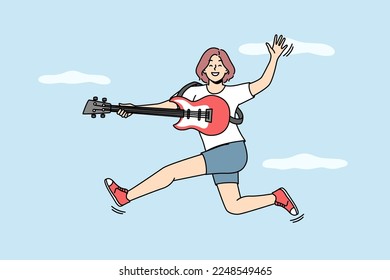 Overjoyed young woman jump in air play on guitar. Smiling girl have fun playing on musical instrument. Hobby and entertainment. Vector illustration. 