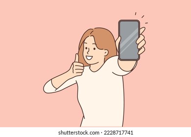 Overjoyed young woman showing mockup cellphone screen with thumb up gesture. Smiling girl demonstrate empty screen on smartphone. Recommendation. Vector illustration. Copy space. 