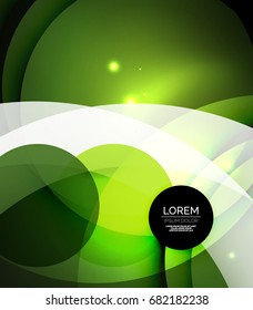 Overlapping circles on glowing abstract background with shining light effects, green magic style design template