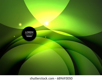 Overlapping circles on glowing abstract background with shining light effects, green magic style design template
