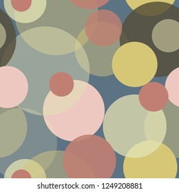 Overlapping circular transparent shapes in pretty seamless vector pattern. Lively  sophisticated colors in various size dots create an all over print suitable for textiles, gift wrapping and fashion.