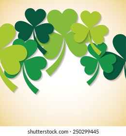 Overlapping shamrock St Patrick's Day card in vector format.