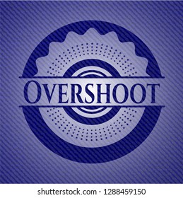 Overshoot emblem with jean background