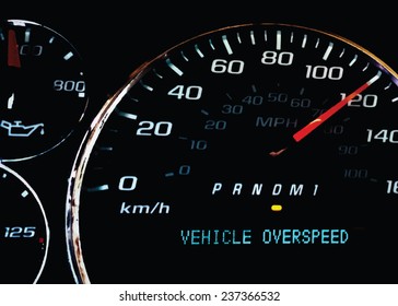 Overspeed warning light on dashboard with dial at 120
