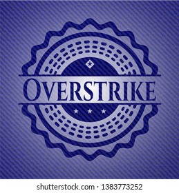 Overstrike badge with denim background. Vector Illustration. Detailed.