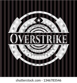 Overstrike silver emblem or badge