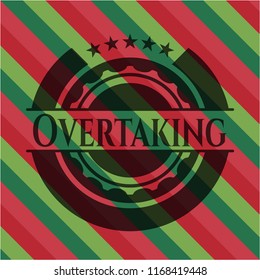 Overtaking christmas colors style emblem.