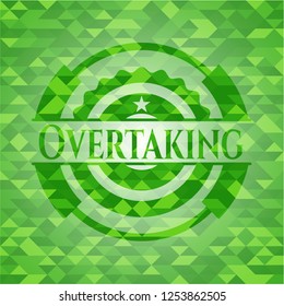 Overtaking green emblem. Mosaic background