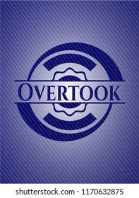 Overtook badge with denim texture