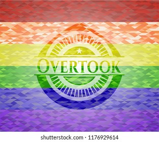 Overtook emblem on mosaic background with the colors of the LGBT flag