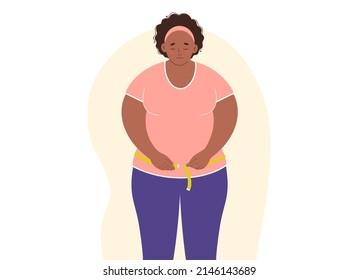 Overweight african-american woman measuring her waist with tape measure. Diet and weight loss concept