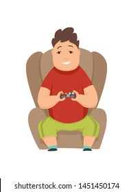 Overweight boy playing computer games and sitting in a soft chair.