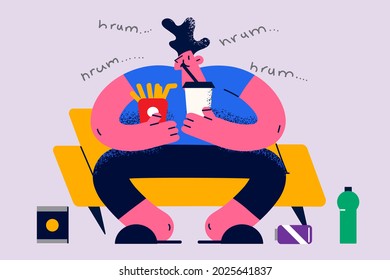 Overweight, obesity and unhealthy eating concept. Young smiling man cartoon character sitting in armchair eating burger french fries and drinking lemonade vector illustration 