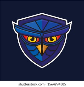 the owl bird character is inserted in a shield with a dominant color in blue. looks simple but elegant is perfect for application icons, personal or company logos.