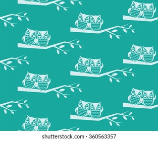 Owl and branch vector art background design for fabric and decor. Seamless pattern