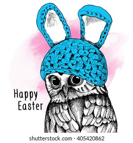 Owl in a bunny hat. Vector illustration.