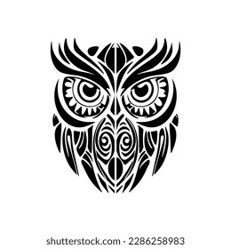 ﻿Tattoo of an owl in BW with Polynesian designs.