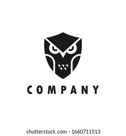  owl combined with a simple and elegant shield. The logo is suitable for business companies, technology, etc.