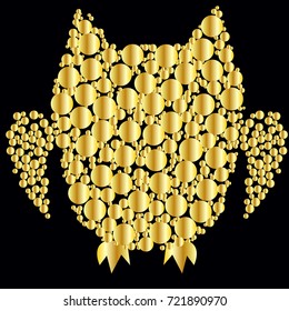 An owl consisting of gold plates on a black background. The symbol of wealth, wisdom
