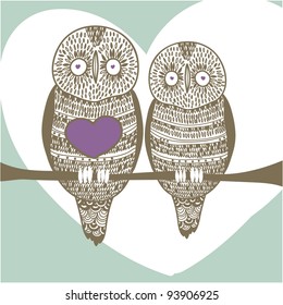 owl couple in love on tree brunch with big heart and heart shaped frame