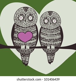 owl couple on tree branch in love with big heart
