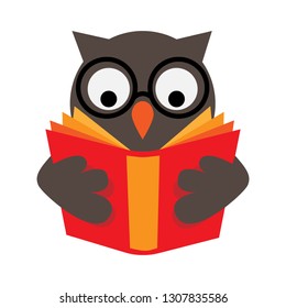 Owl with eyeglasses is reading red book, wisdom and education concept and symbol.