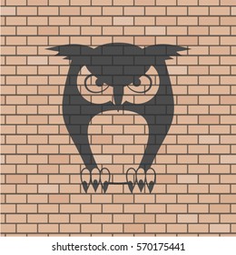 Owl illustration in brick wall