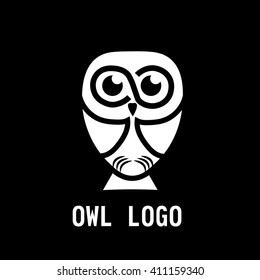 Owl logo in black background
Creative owl sitting in the darkness of night logo